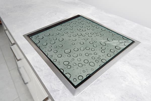 GLASSKYDDSPLÅT FÖR SPIS 50x52 DROPS