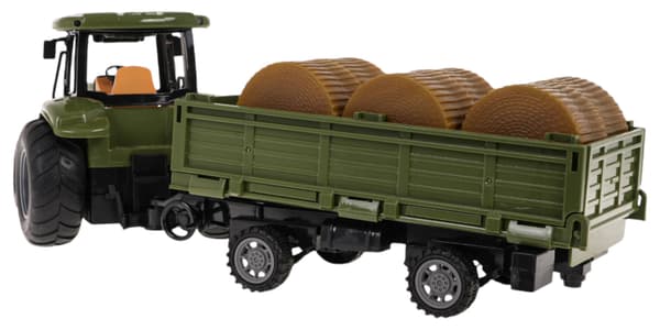 Grön R/C-traktor med släpvagn