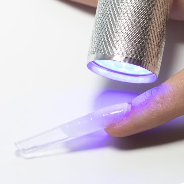 Mini LED/UV 9W kynsilamppu leimaustyökalulla