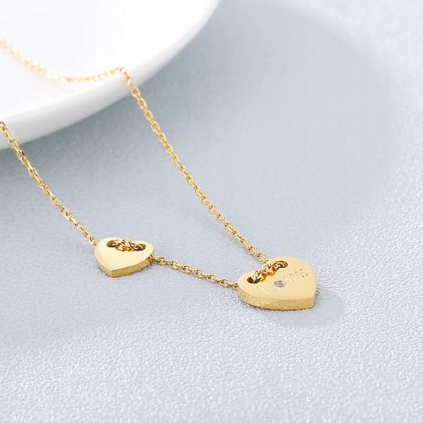 Collar de acero con corazón ajustable dorado