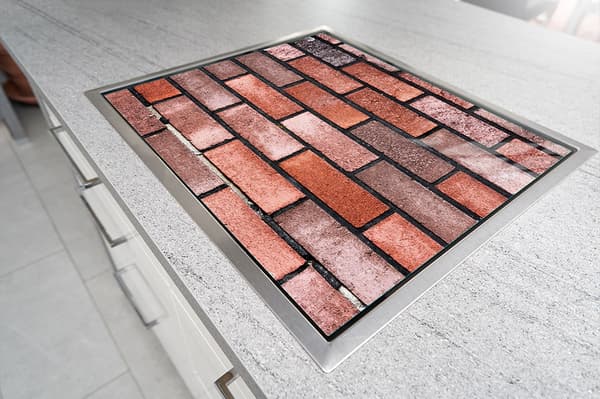 GLASSKYDDSPLÅT FÖR SPIS 70x52 TEGL