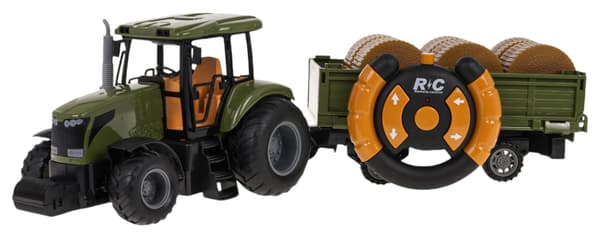 Grön R/C-traktor med släpvagn