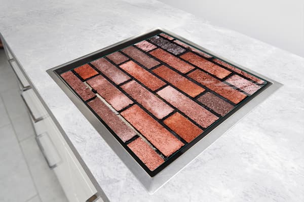 GLASBESKYTTELSESPLADE TIL KOMFUR 50x52 MURSTEN