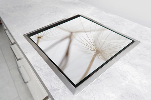 GLASSKYDDSPLÅT FÖR SPIS 50x52 BLOMMA
