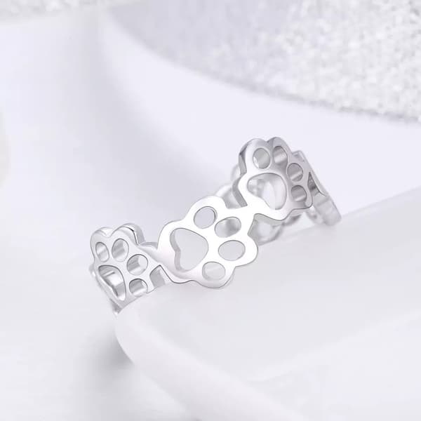 Anillo de plata ajustable con forma de pata S925