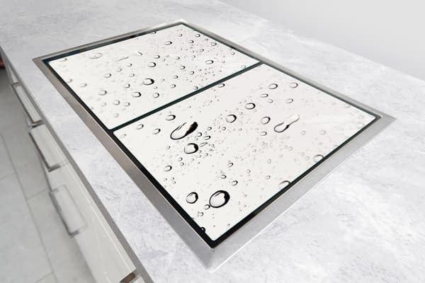 GLASBESKYTTELSESPLADE TIL KOMFUR 85x52 DROPS