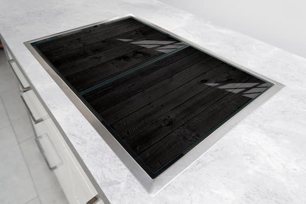 GLASSKYDDSPLÅT FÖR SPIS 85x52 TRÄ