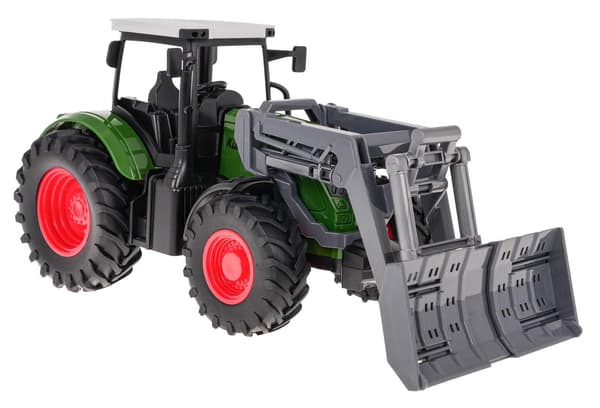 Grön traktor med bulldozer