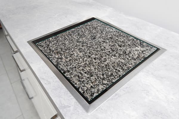 GLASSKYDDSPLÅT FÖR SPIS 50x52 GRANIT