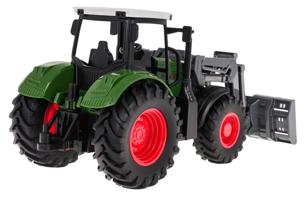 Grön traktor med bulldozer