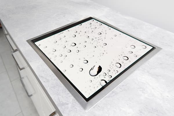 GLASSKYDDSPLÅT FÖR SPIS 50x52 DROPS