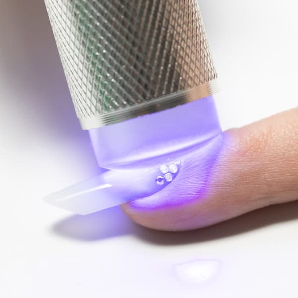 Mini LED/UV 9W kynsilamppu leimaustyökalulla