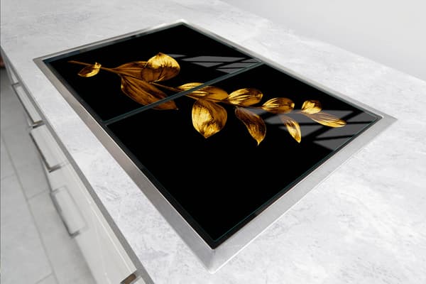 GLASSKYDDSPLÅT FÖR SPIS 70x52 GULD