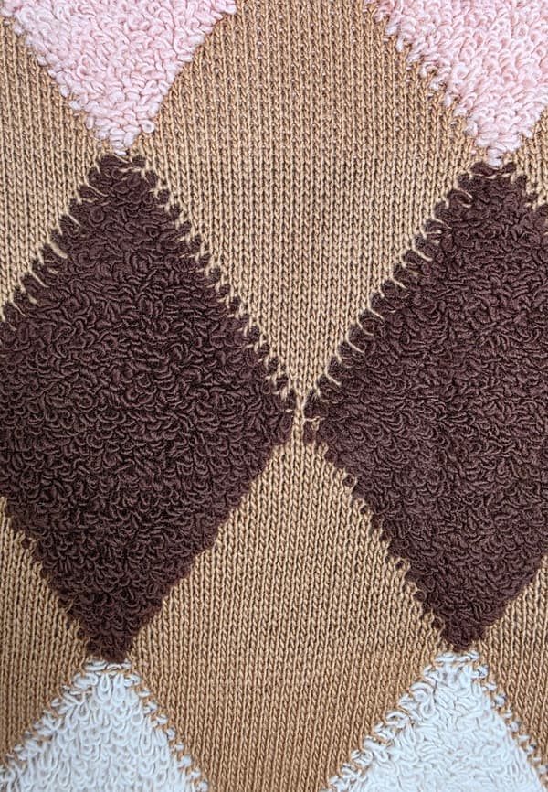 Diamantmönstrad kofta utan knäppning beige strl M
