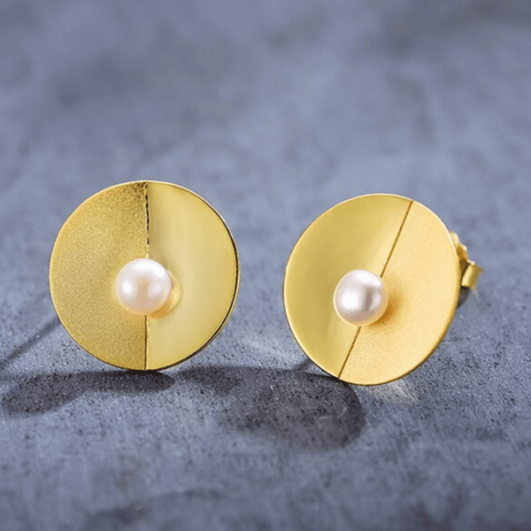 Pendientes de plata con perla dorada