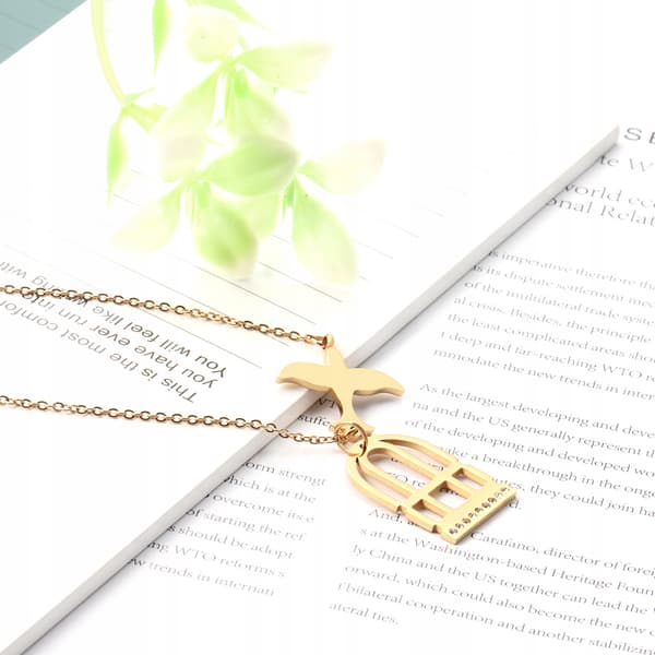 Collar de cadena de oro con pájaro libre de acero