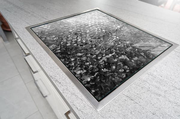 GLASSKYDDSPLÅT FÖR SPIS 70x52 DROPS