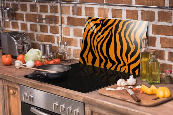 GLASSKYDDSPLÅT FÖR SPIS 70x52 TIGER