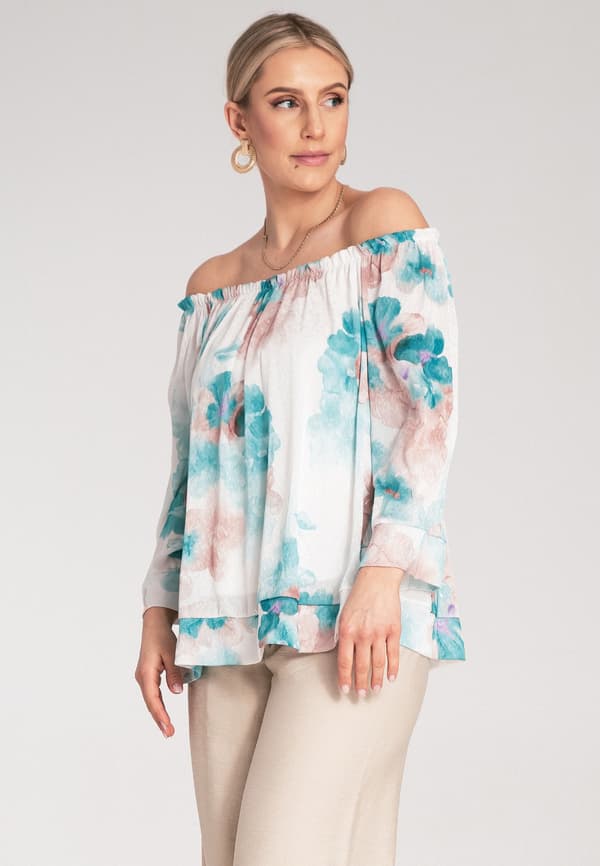 Blommig blus med puffärmar turkos S/M