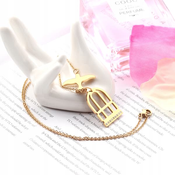 Collar de cadena de oro con pájaro libre de acero