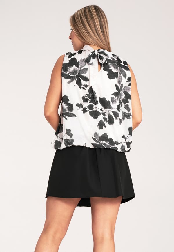 Elegant ærmeløs blomsterbluse - Sort bluse størrelse S/M