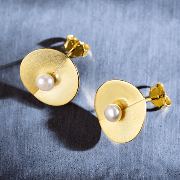 Pendientes de plata con perla dorada