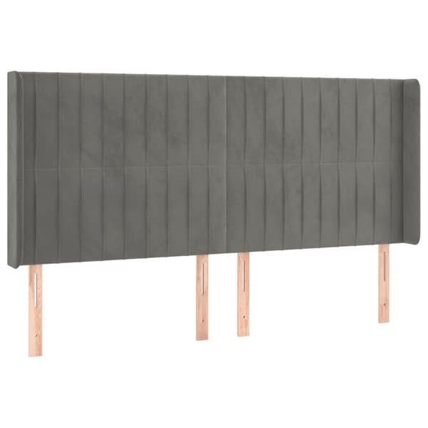 Sänggavel LED ljusgrå 163x16x118/128 cm sammet