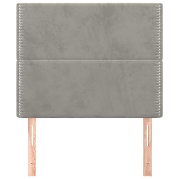 Sänggavel ljusgrå 100x5x118/128 cm sammet