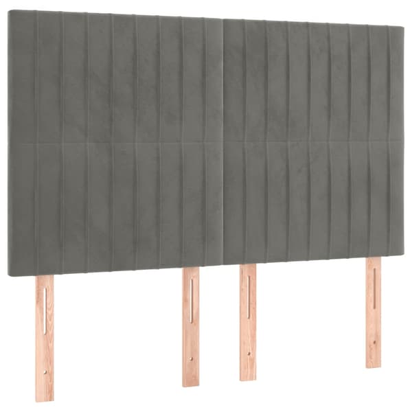 Sänggavel LED ljusgrå 144x5x118/128 cm sammet