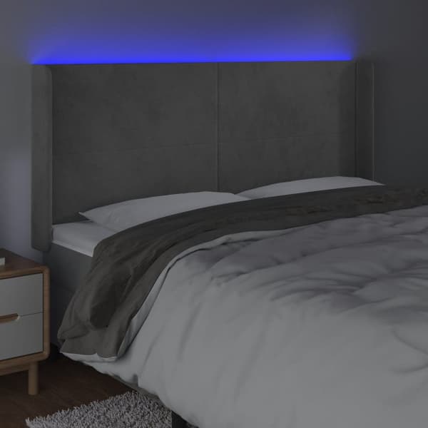 Sänggavel LED ljusgrå 203x16x118/128 cm sammet