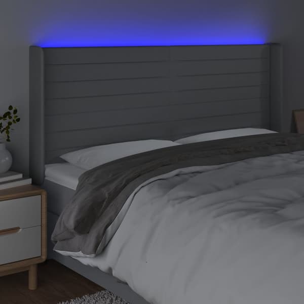 Sänggavel LED ljusgrå 203x16x118/128 cm tyg