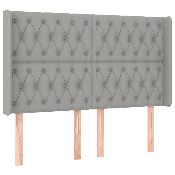 Sänggavel LED ljusgrå 147x16x118/128 cm tyg