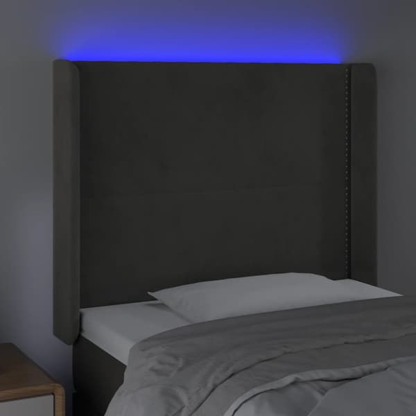 Sänggavel LED ljusgrå 103x16x118/128 cm sammet