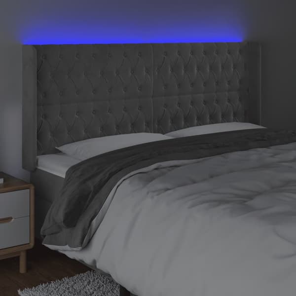 Sänggavel LED ljusgrå 203x16x118/128 cm sammet