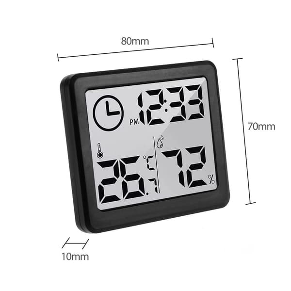 Digitalt termometer og hygrometer med urfunktion, der viser omgivelsestemperatur og luftfugtighed (sort).