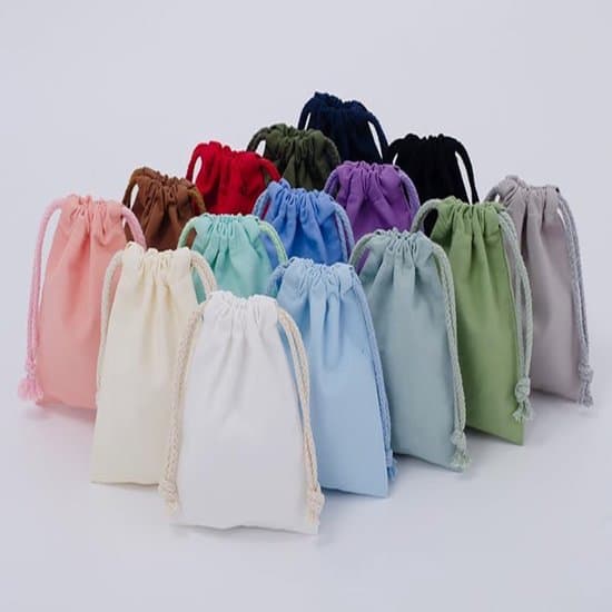 10-pack 7x10 cm marinblå present- och smyckespåsar i bomull med dragsko