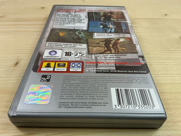 SPLINTER CELL ESSENTIALS – game disc in very good+ condition, complete PSP set