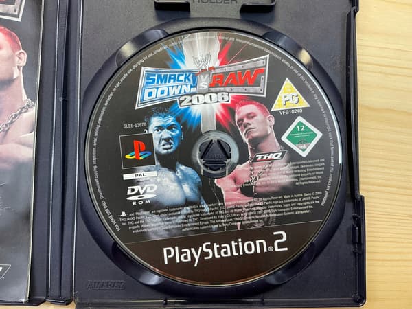 SMACK DOWN VS RAW 2006 disc – very good+ condition, complete PS2 set