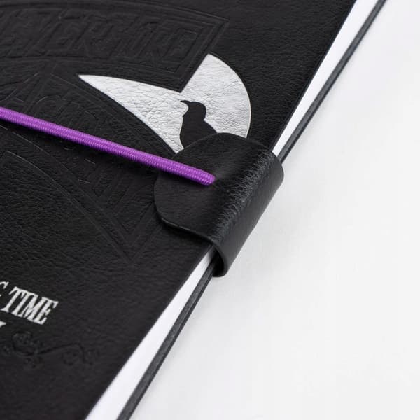 Black notebook with an elastic band, Wednesday