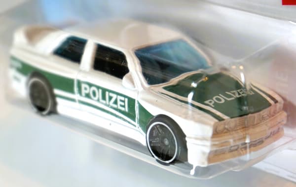 HOT WHEELS 92 BMW M3 POLIZEI UNIQUE + PROTECTOR – NEW SPRING-DRIVE CAR