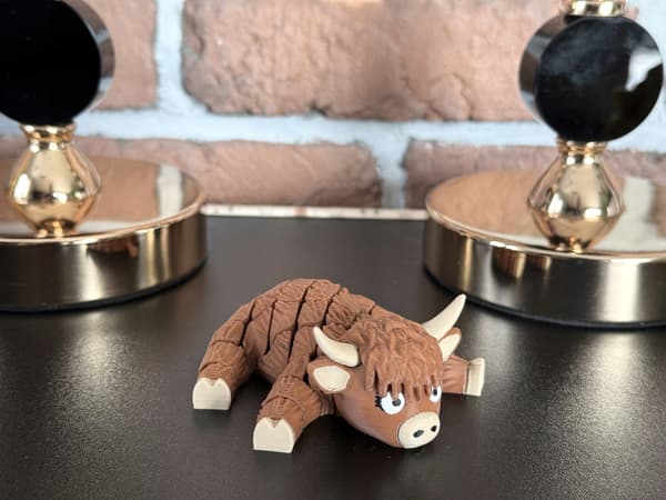 Cute segmented Fudge, 3D Mountain Cow – a charming, movable figurine