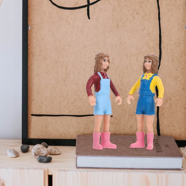 A SET OF COLOURFUL MINI FIGURINES FOR DISPLAY