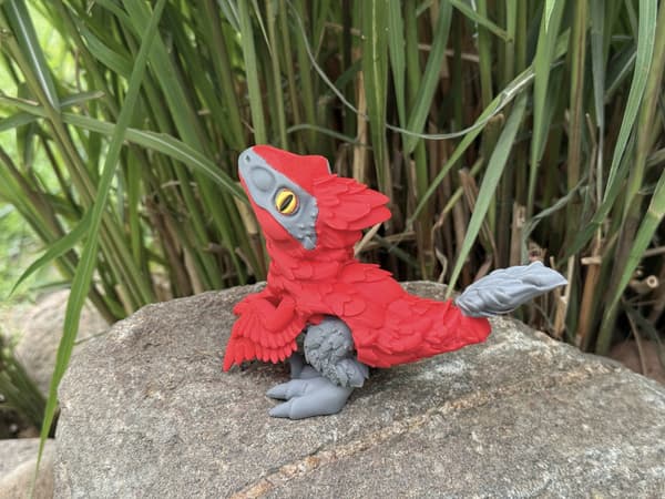 Pyroraptor dinosaur 3D moving figurine inspired by the feathered predator