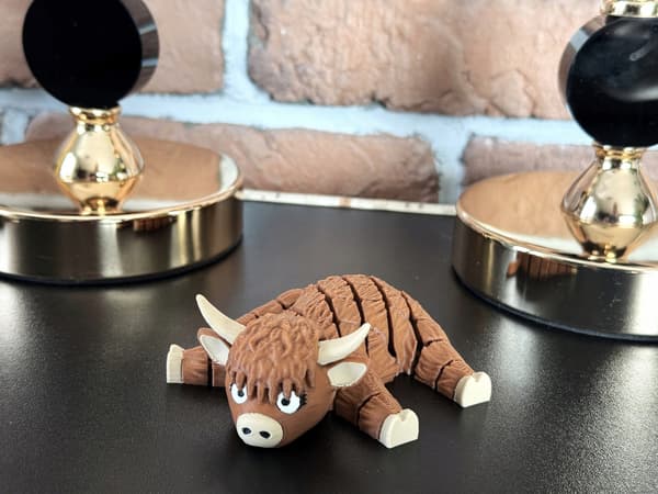 Cute segmented Fudge, 3D Mountain Cow – a charming, movable figurine