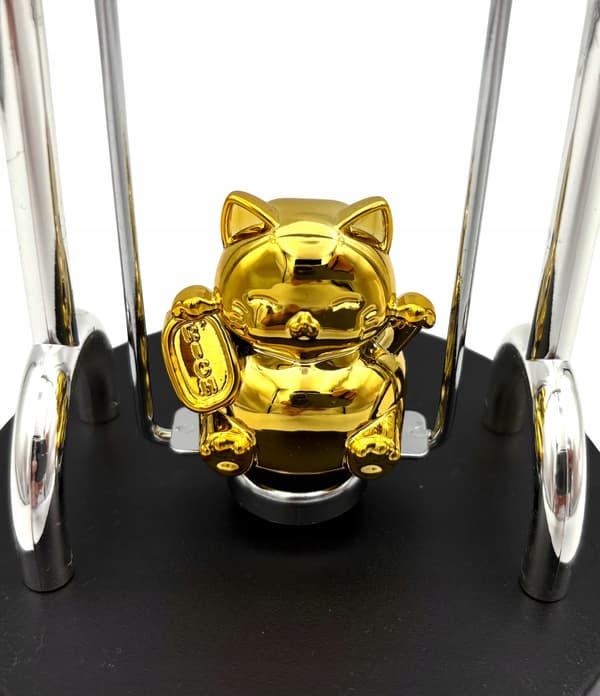 USB-powered perpetual motion toy: a magnetic swing with a kitten.