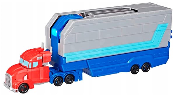 TRANSFORMERS PLAY SET: OPTIMUS PRIME COMBAT TRAILER TOY FIGURE