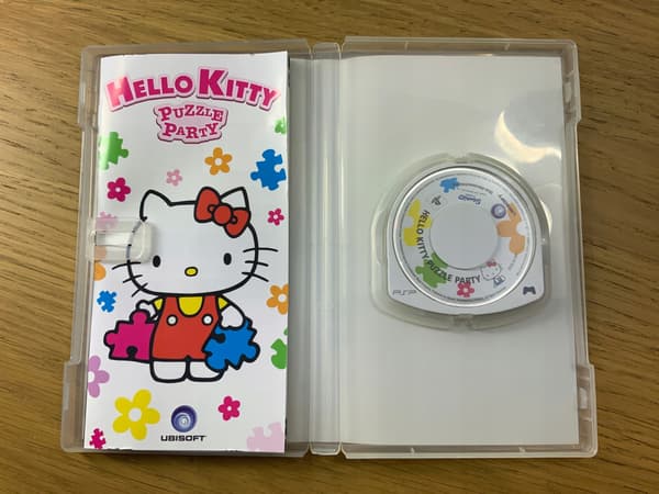 HELLO KITTY PUZZLE PARTY CD – very good+ condition, complete PSP set