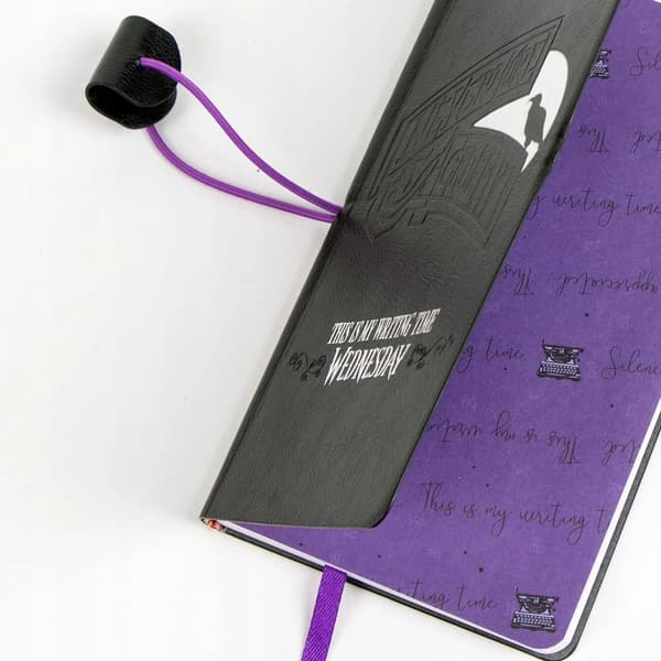 Black notebook with an elastic band, Wednesday