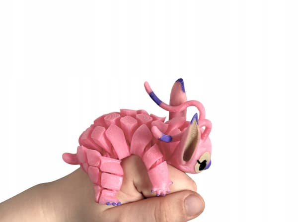 Pink creature, 3D alien – a flexible figurine with moving parts