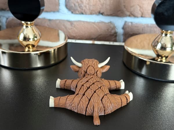 Cute segmented Fudge, 3D Mountain Cow – a charming, movable figurine